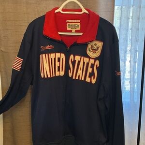 This is a vintage Mondetta USA Banner Jacket in blue